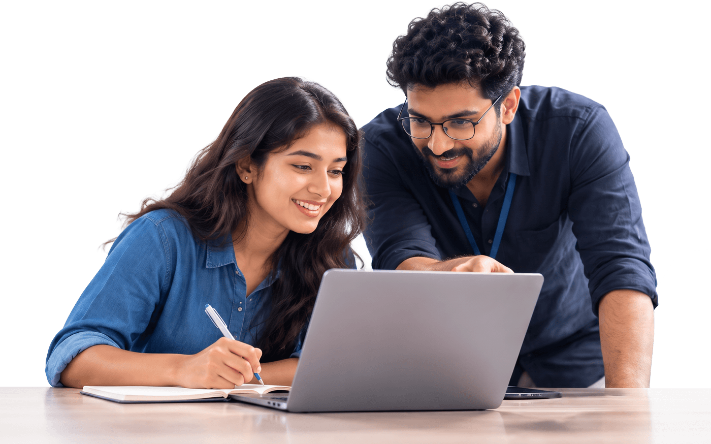 A TekSpotEdu instructor helping a student at their desk